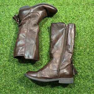 Brown leather knee high boots with